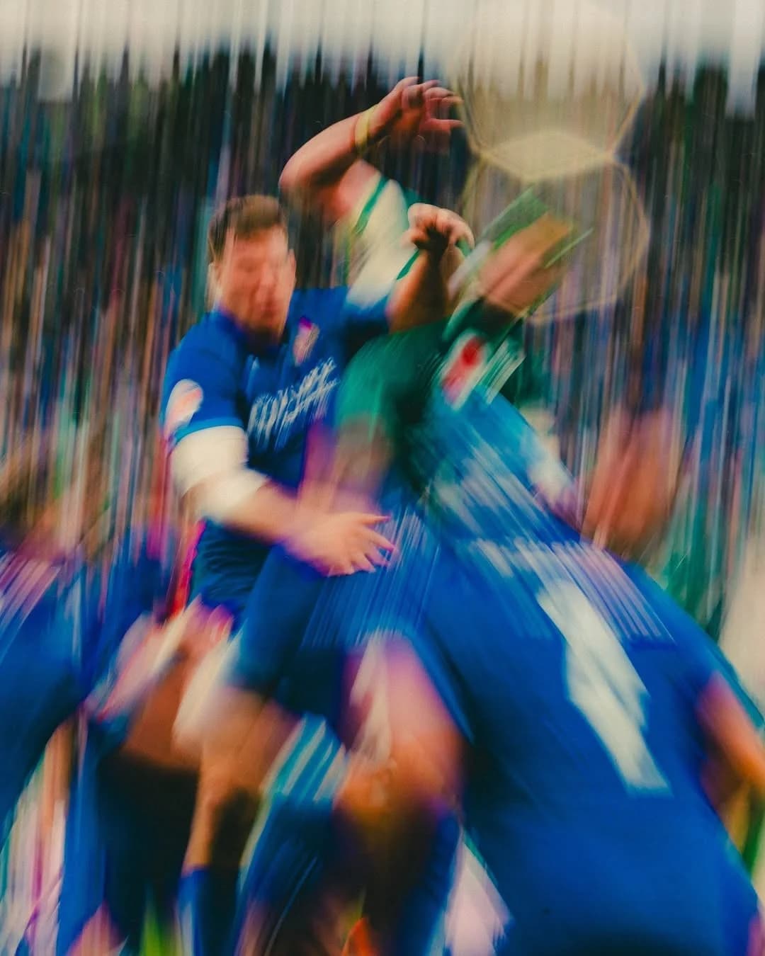 Rugby players contesting the ball during a Six Nations match